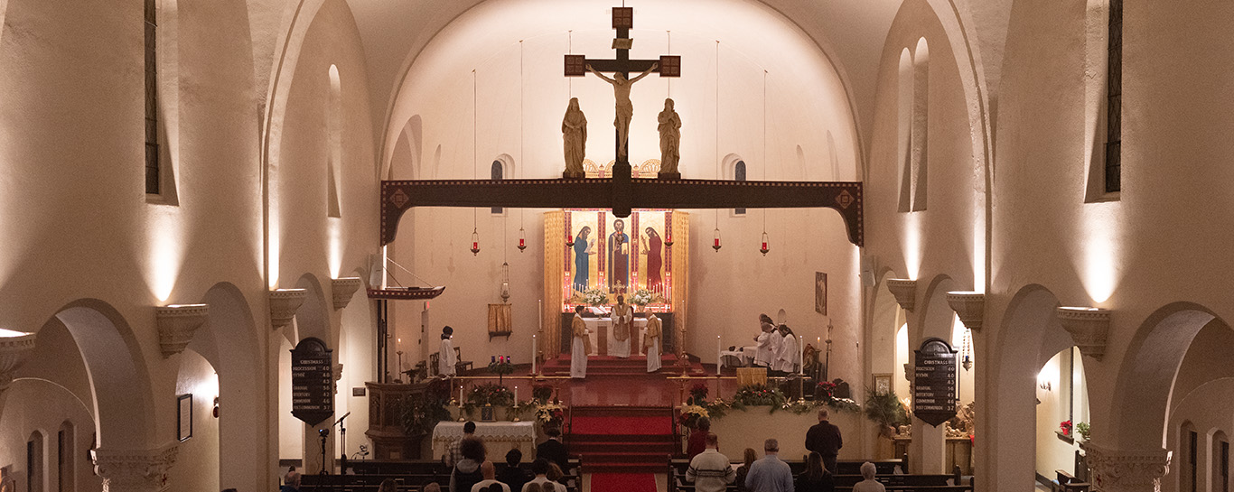Fr Kwari giving Mass intentions on Christmas Eve