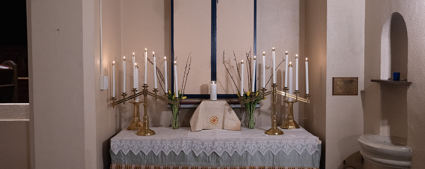 Lady Altar on Monday Thursday with the reserve Host surrounded by candles