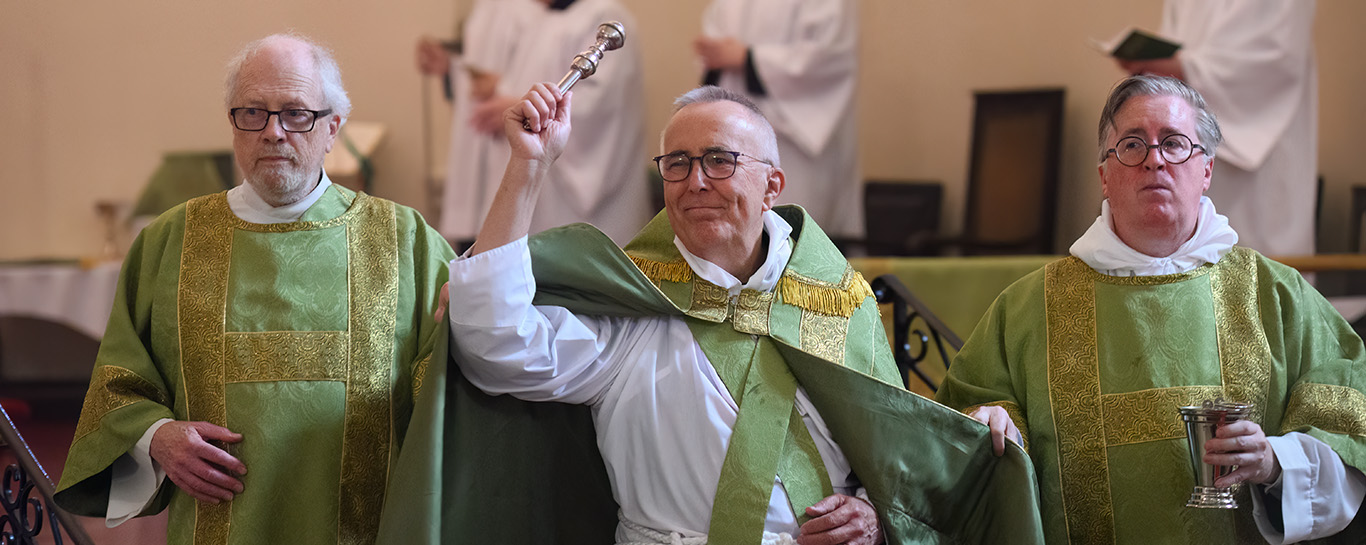 Fr Tudin sprinkles holy water during the asperges on Trinity IX, August 2, 2026