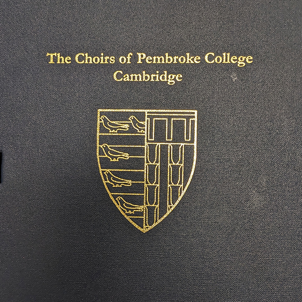 Cover of choir folder for Pembroke College showing its coat of arms