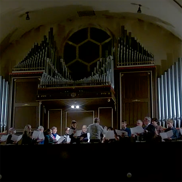 A screenshot of the Advent Carol Service video showing the choir