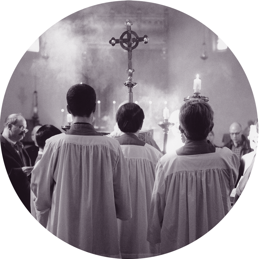 Three servers with crucifix