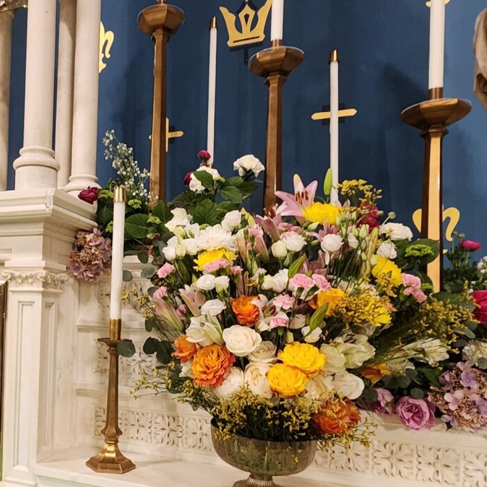 Detail of the high altar showing a flower bouquet
